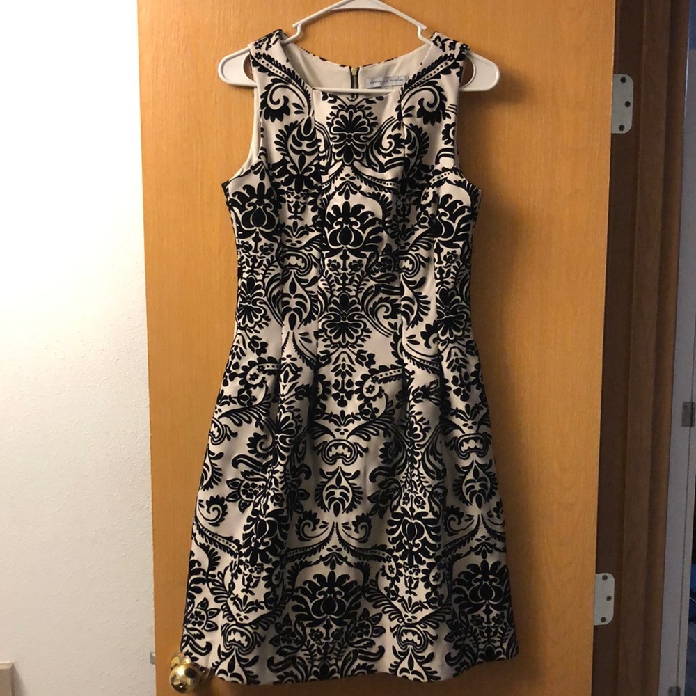 Tan and black Aline Dress with pockets worn a few times. But looks brand new
